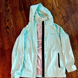 Like new vineyard vines women’s raincoat, mint color with navy trim!